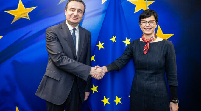 Alban Kurti, on the left, and Marta Kos